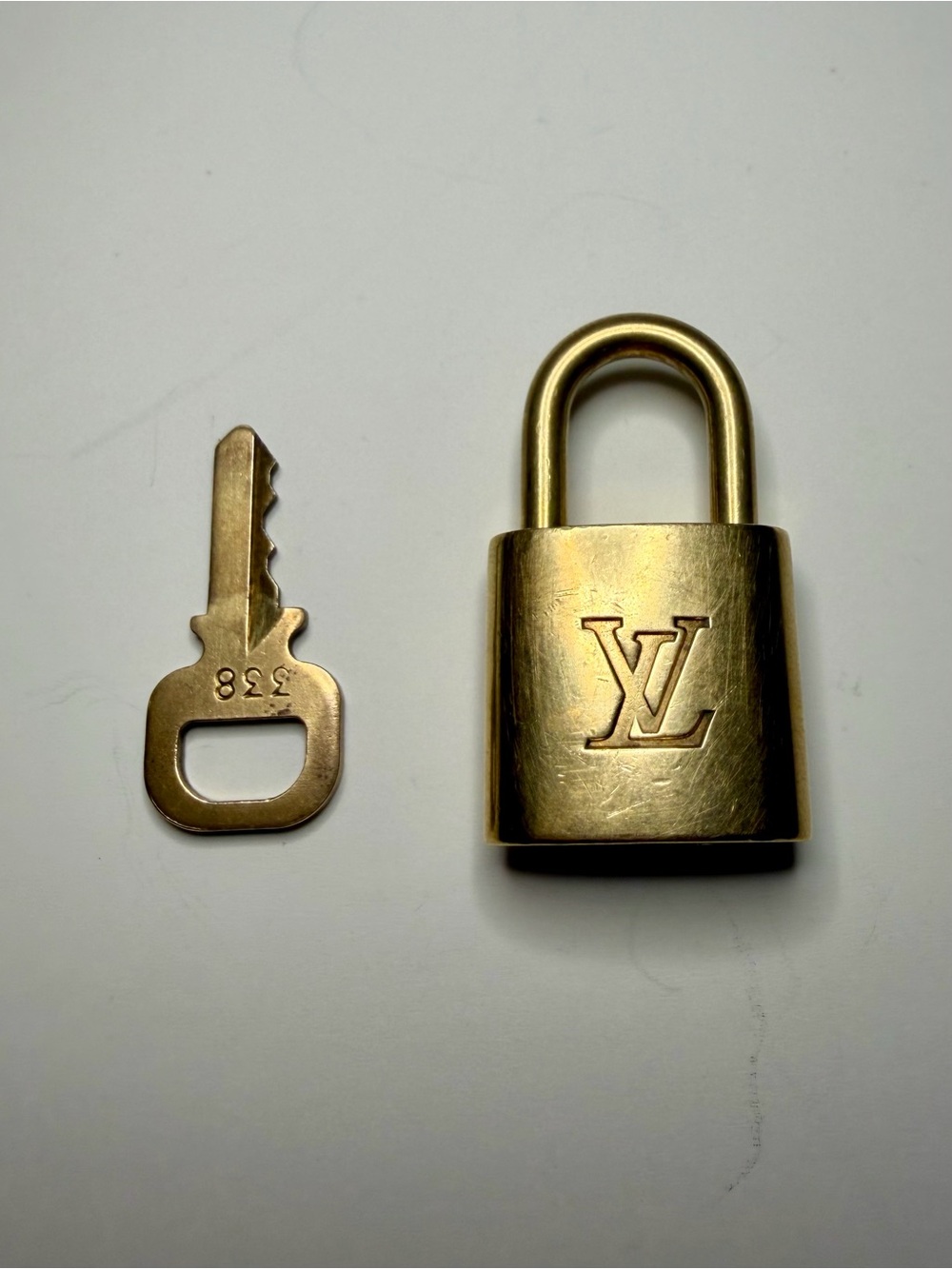 Louis Vuitton Gold-Tone LV Padlock with Key